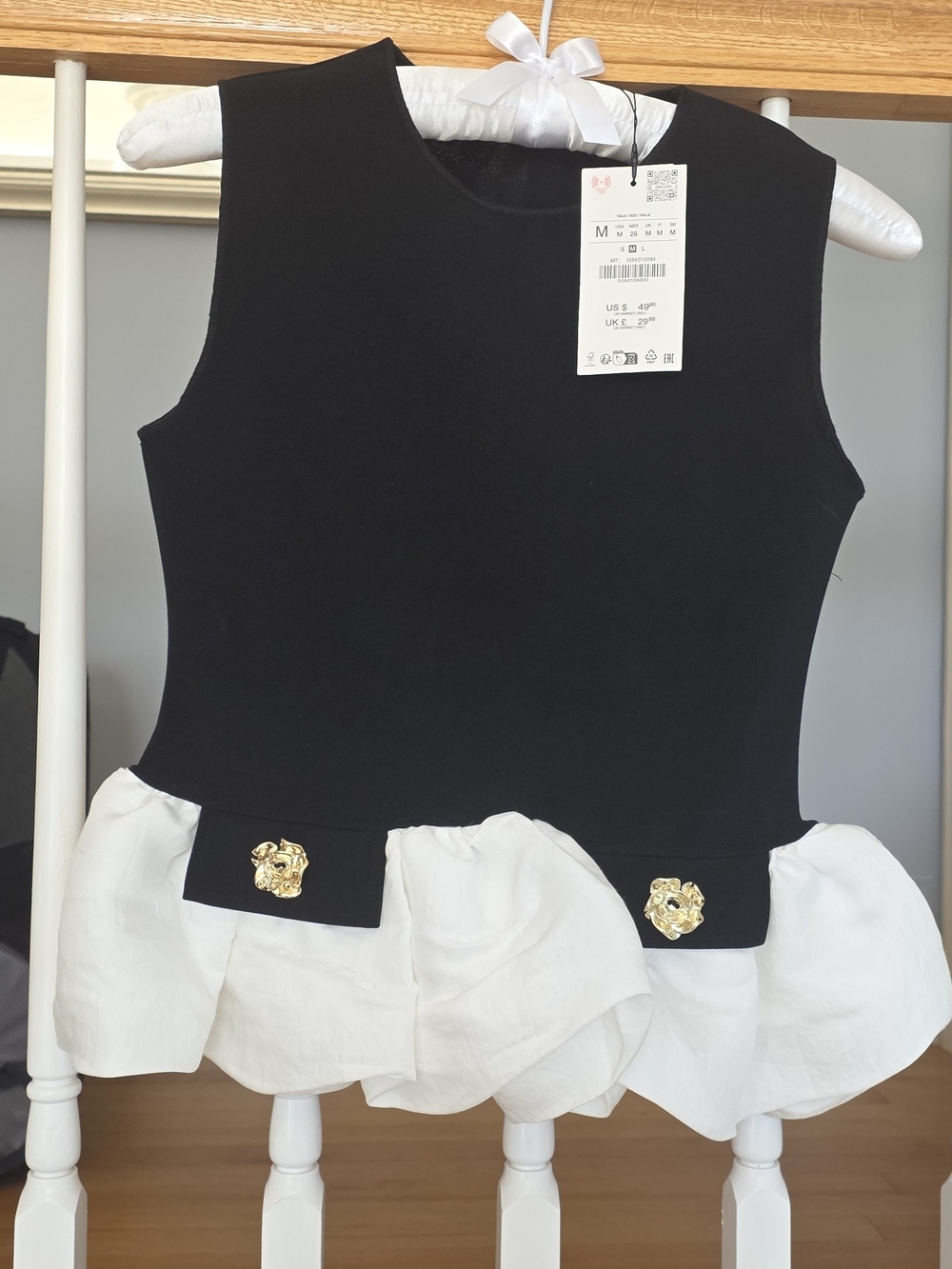 Zara Black Sleeveless Top with White Ruffle and Gold Button Accents